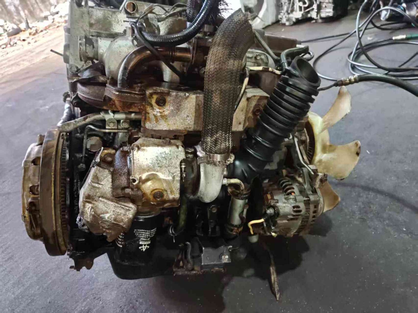 Close-up detail of Mitsubishi 4M40T turbo diesel engine