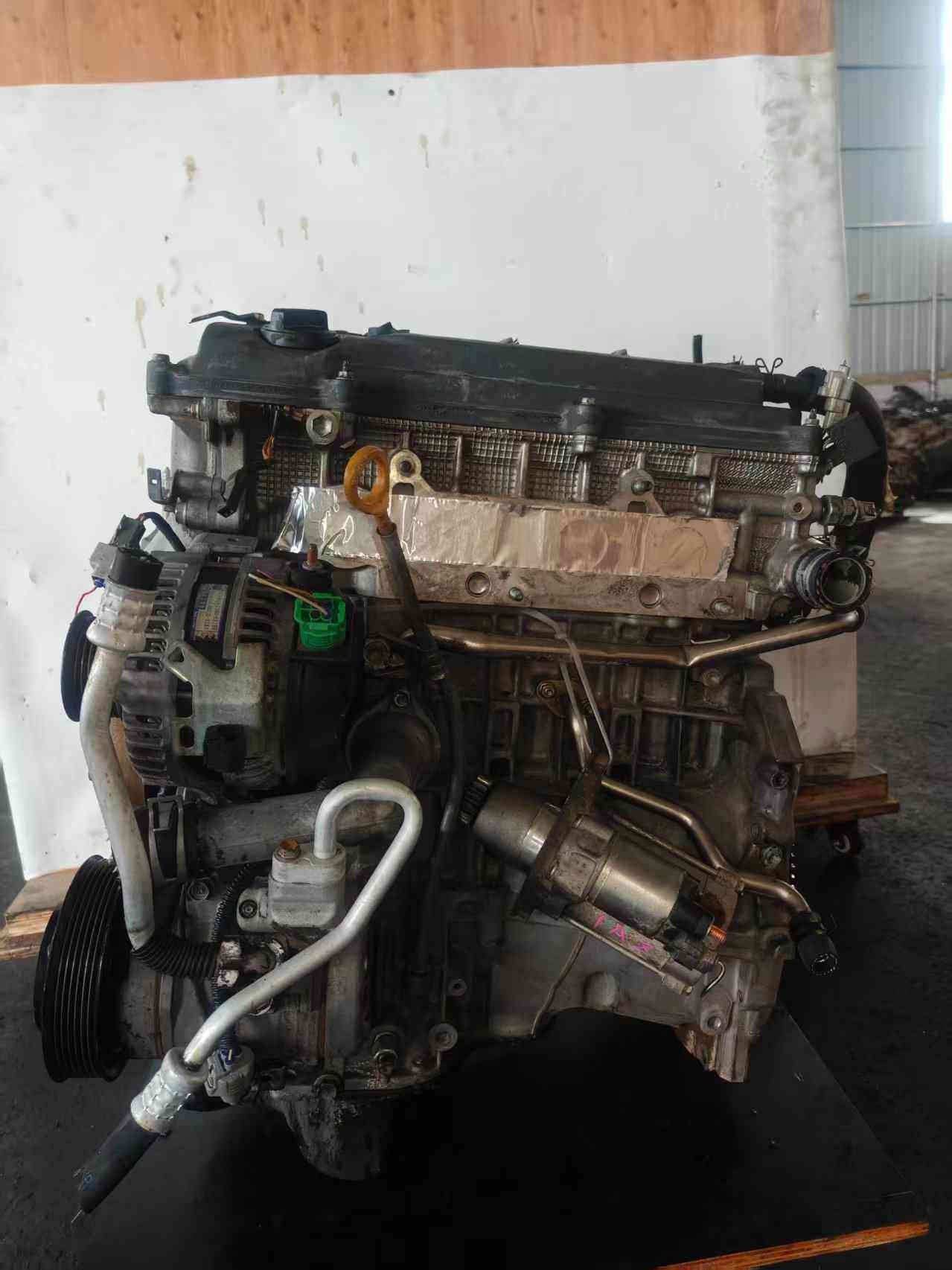 Toyota 1AZ used engine side view with alternator and starter motor