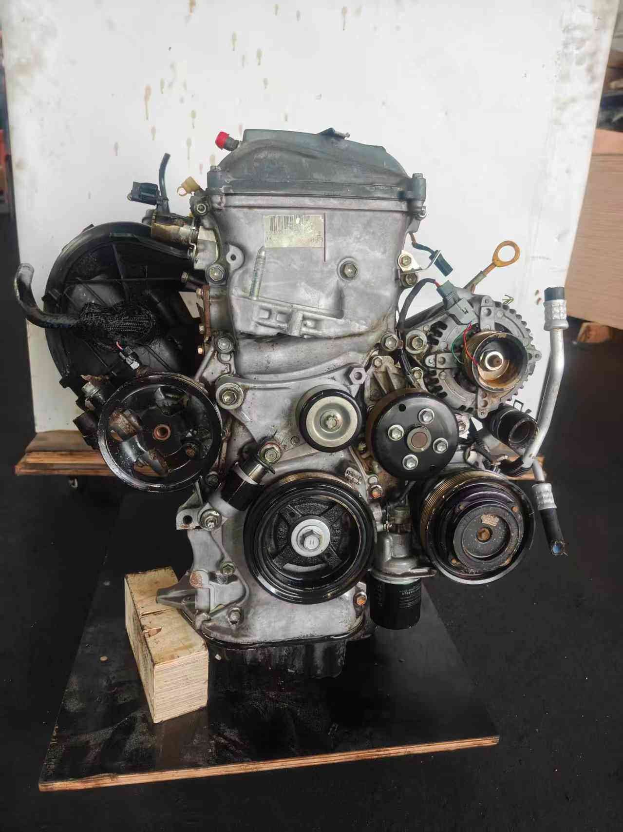 Top view of Toyota 1AZ engine with ignition coils and intake manifold