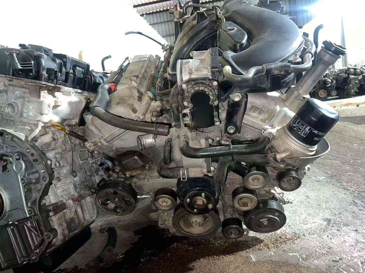 Toyota 1GR engine front view showing pulleys and oil filter