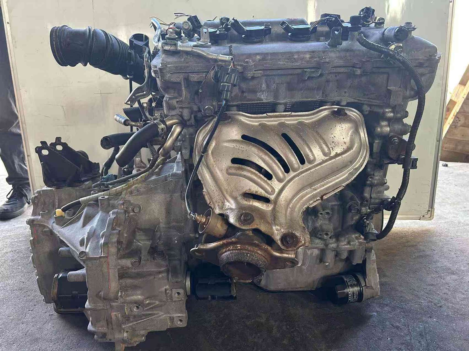 Toyota 1ZR engine exhaust side with heat shield and transmission