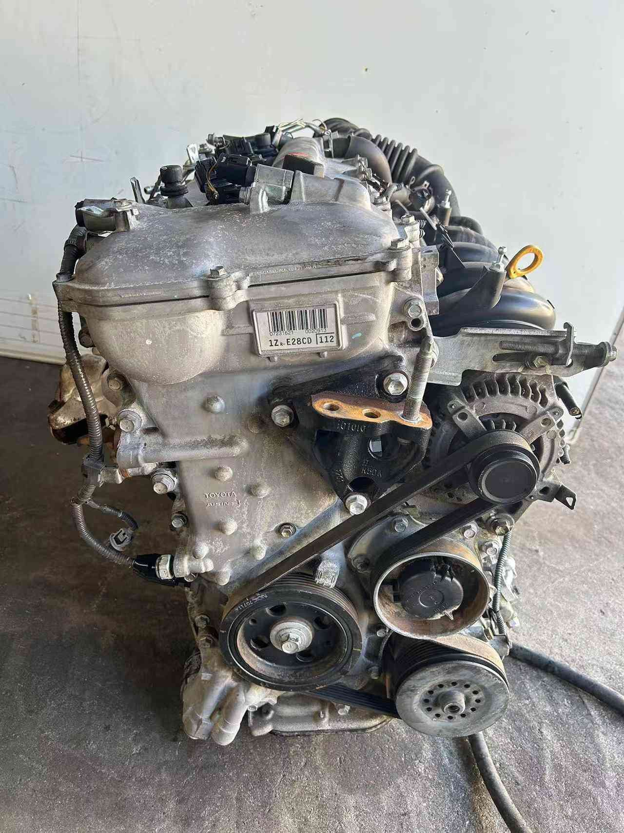 Toyota 1ZR used engine with automatic transmission viewed from the rear