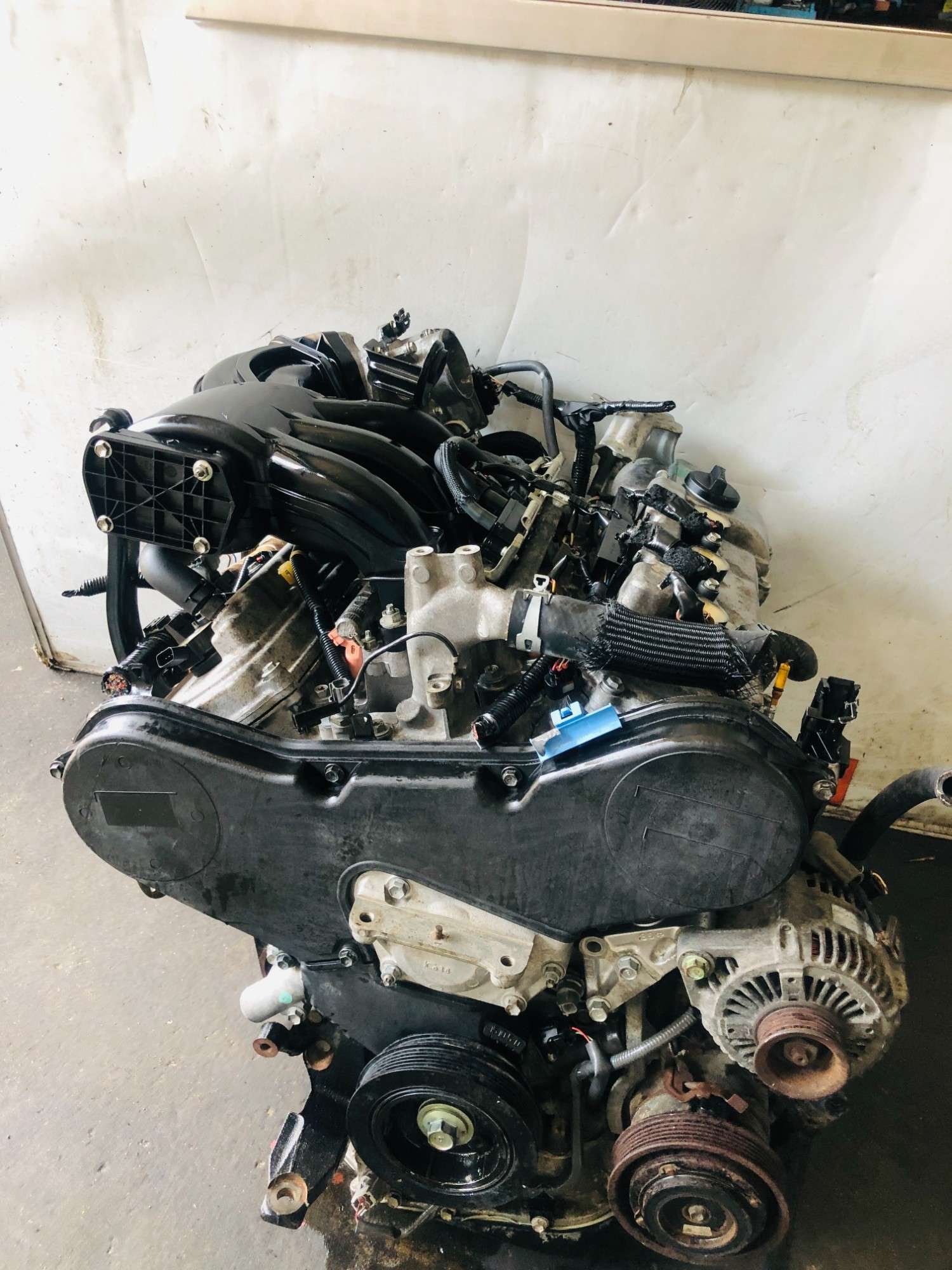 Toyota 3MZ-FE engine timing side with pulleys and alternator