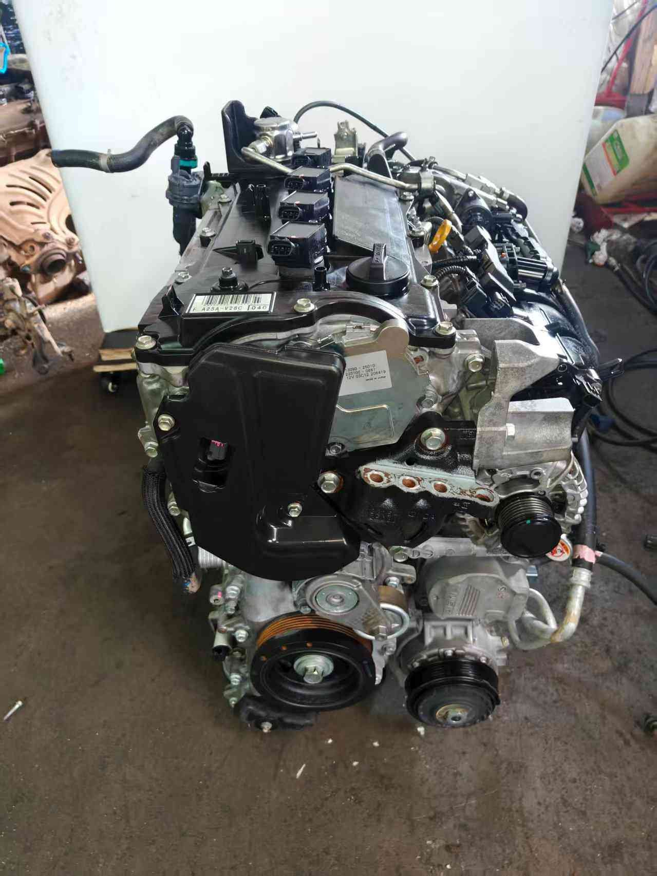 Toyota A25A engine front angle showing pulleys, alternator and valve cover